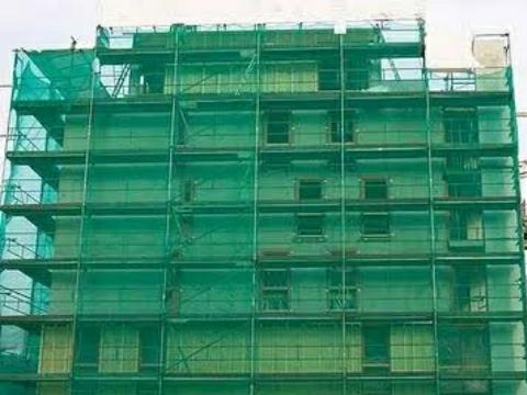 Interesting facts why under construction building is covered with green curtain